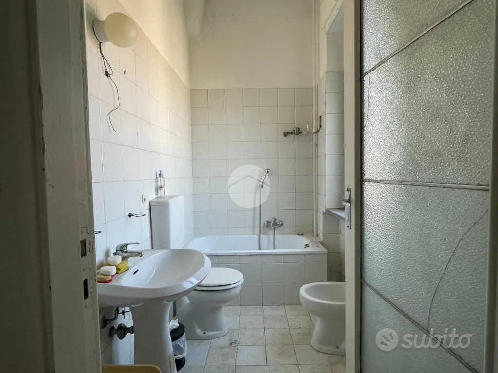 Bagni - Triplex with Balcony in Asti's Historic Centre