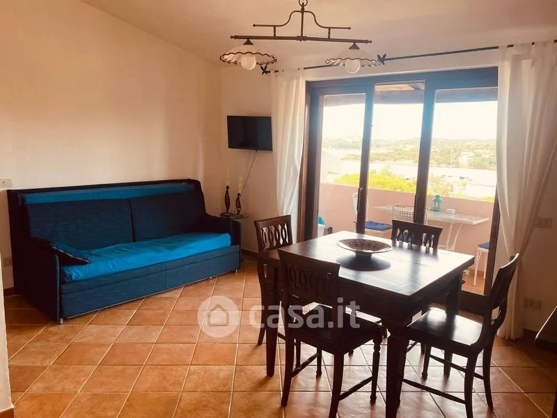 Dining Room - Apartment with Balcony and Pool in Arzachena