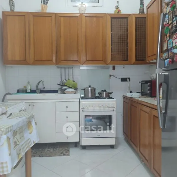 Cuisine - Three-Bedroom Apartment with Private Courtyard in Bari
