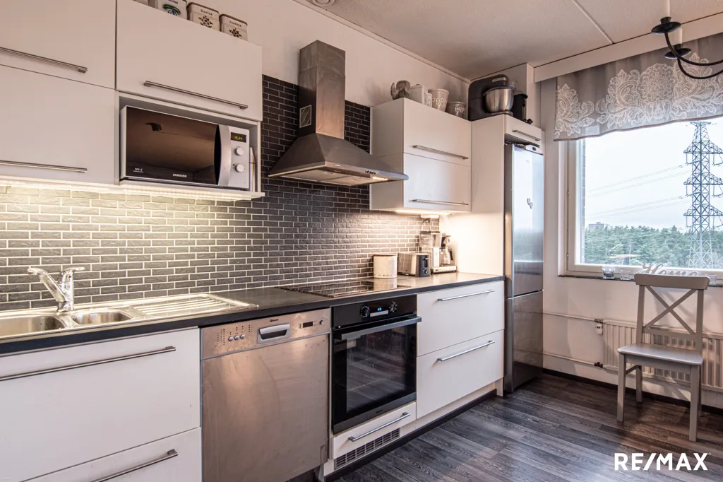 Cuisine - Renovated Flat with Glazed Balcony in Nättinummi