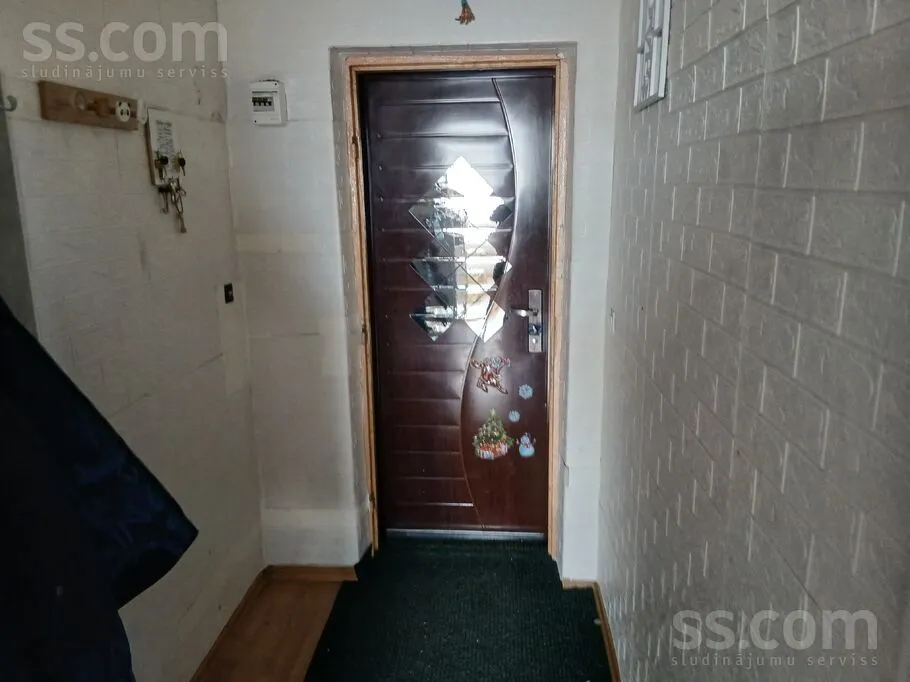 Entrée - Two-Bedroom Apartment with Fireplace in Griškāni